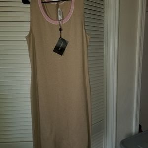 Beige dress trimmed in pink.